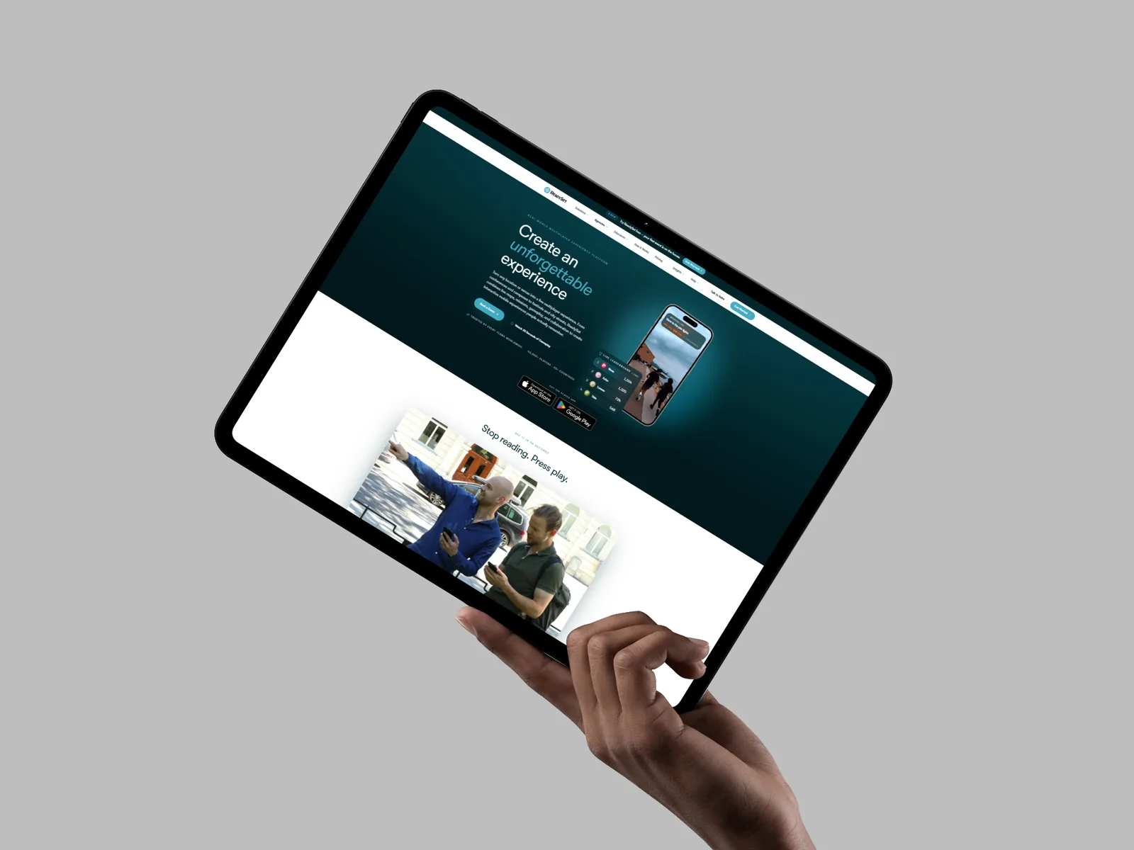 The new ReadySet homepage shown on an iPad held in mid-air, with the 'Stop reading. Press play.' section visible below the hero.